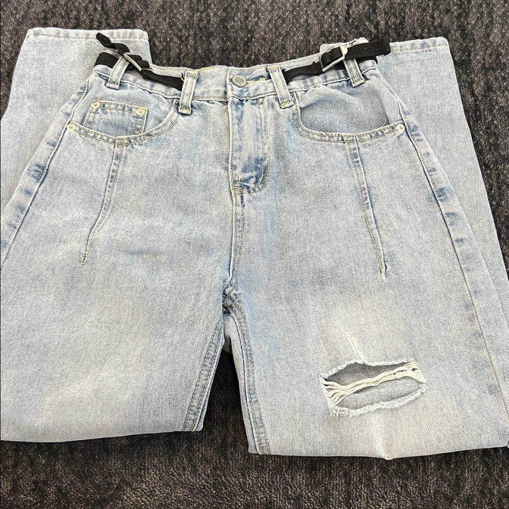 Womens vintage Fubu jeans size 23. Has some stretch as well as black pulls